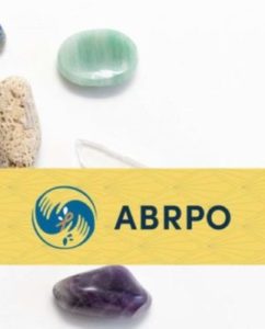 ABRPO Grounding - Getting present with yourself and others - decorative background image of rocks and gemstones